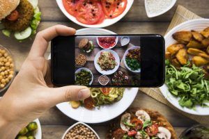 Taking a photo of vegan plates