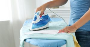Young-woman-ironing-clothes